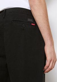 Levi's® XX CHINO EZ TAPER II - Calças - meteorite
