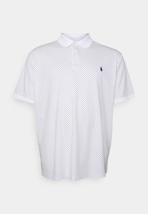 Witte korte mouwen polo met kleine zwarte polkadots en een witte kraag, met een klein geborduurd logo op de linkerborst.