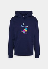 Navyblå hoodie med kängurufickor; har en färgglad kanin grafisk design i rosa, blått, gult och grönt på framsidan.