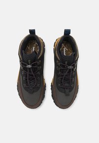 Timberland GREENSTRIDE MOTION 6 LACE UP UNISEX - Zapatillas altas - black/brown