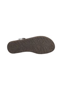 Brown rubber sole with textured grip pattern and embossed brand name, featuring a rounded toe and slight curvature at the heel.