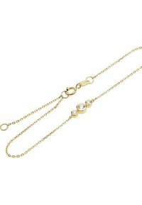 Guldarmband med tre cirkulära klara stenar i en linjär inställning, med en gripkrok och en delikat länkdesign.