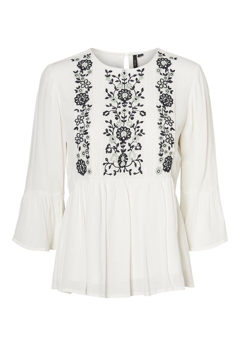 Weiße Bluse mit schwarzem Blumenstickerei auf der Vorderseite. Verfügt über einen runden Ausschnitt, lange Ärmel und einen gefältelten Saum. Weicher Griff.