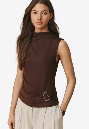 Brown sleeveless top with a high neck, featuring a twisted side detail and silver hardware accent. Smooth texture, fitted design.