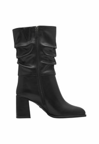 Botte en cuir noire mi-mollet avec fermeture éclair latérale, dessus souple et talon bloc.