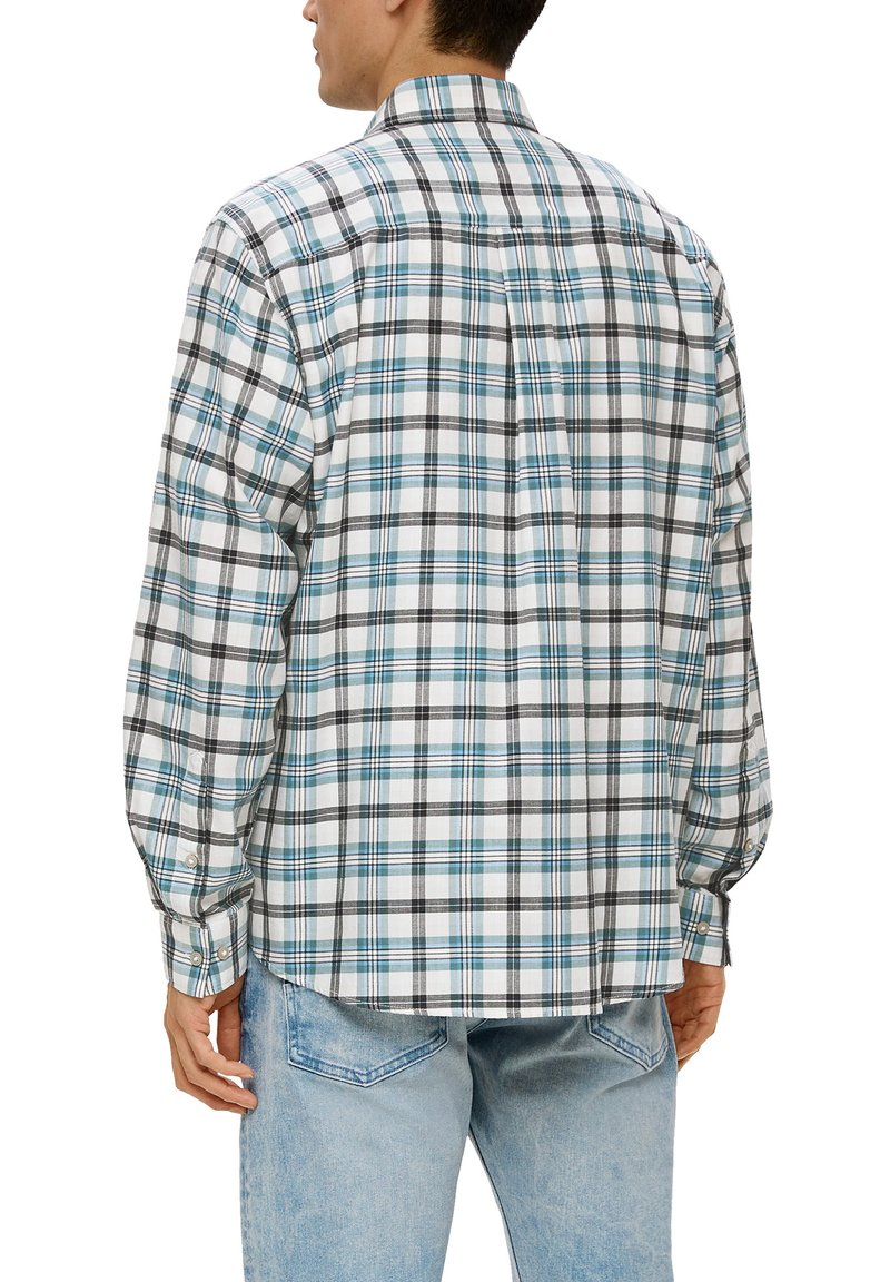 Chemise à manches longues à carreaux en blanc, noir et turquoise. Dotée d'un col boutonné et d'un ourlet arrondi avec une coupe ample. Matière en coton.