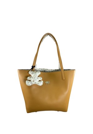 Borsa tote in pelle color cuoio con doppio manico e portachiavi bianco a forma di orsacchiotto con motivo floreale attaccato.