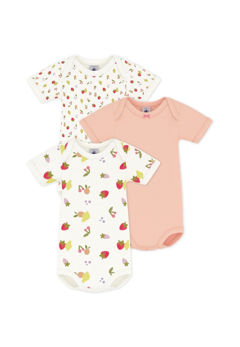 Τρία κοντομάνικα βρεφικά φορμάκια: ένα λευκό με μοτίβα φρούτων, ένα λευκό με πολύχρωμα σχήματα και ένα μονόχρωμο ροδακινί με διακοσμητικό φιόγκο.