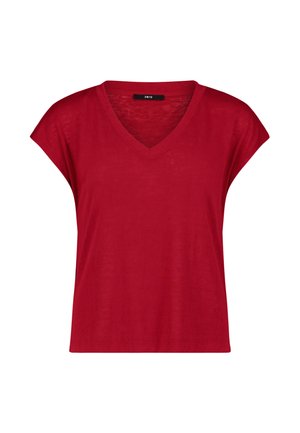 Haut rouge pour femme à manches courtes et col en V, coupe ample avec une petite étiquette noire à l'intérieur du col.