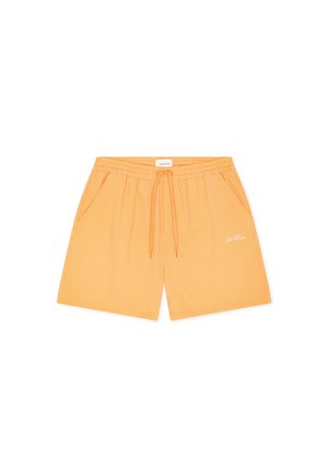 Shorts orange texturés avec cordon de serrage, poches latérales et petit logo blanc brodé sur le devant de la jambe droite.