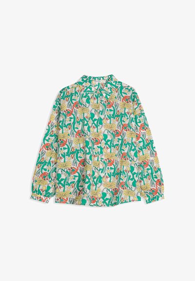 Chemise à manches longues avec boutons, motif floral et feuillage coloré en vert, jaune et rouge sur fond blanc.