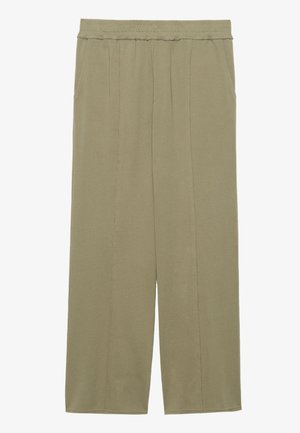 Pantalon khaki à coupe ample avec taille élastique et poches latérales, présentant des détails visibles de coutures verticales le long des jambes.
