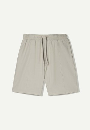 Light gray athletic shorts made from a smooth, breathable fabric. Features an elastic waistband with a drawstring and subtle side seams.