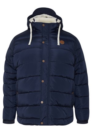 Donkerblauwe pufferjas met een faux fur-voering in de kap, voorzien van een knoopsluiting aan de voorkant, zijzakken en geribde manchetten. Glad, glanzend materiaal.