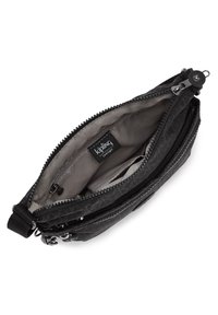 Black fabric crossbody bag with multiple zippered compartments and a gray interior, featuring a logo tag and textured exterior pattern.