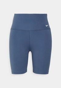 Granatowe, wysokowcinane sportowe szorty rowerowe z małym białym logo Nike na lewej górnej części talii, bezszwowa konstrukcja.