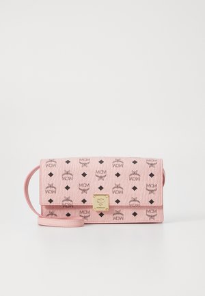 Pink synthetic leather crossbody bag with black printed logo and diamond patterns, featuring a gold metal clasp and adjustable strap.