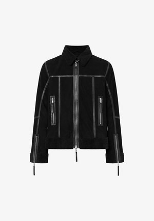 Černá kožešinová bunda s předním zipem, zipovými bočními kapsami, zipovými manžetami a koženými detaily na límci a švech.