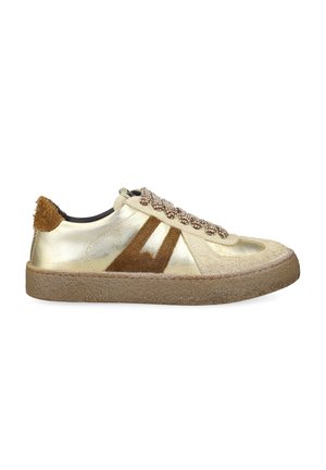 Low-top sneaker with gold body, brown suede accents, patterned laces, and a textured brown rubber sole.