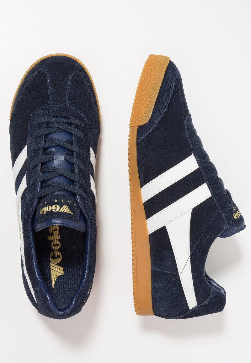 Buy womens Harrier Mirror trainers in black/gold/gum online