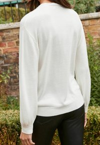 Next Sweter