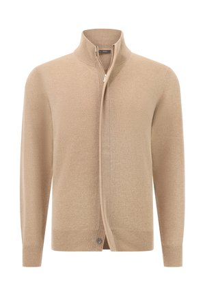 Vaalean beige vetoketjulla varustettu neuletakki, jossa on korkea kaulus, ribatty hihansuu ja helma, esillä valkoisella taustalla.