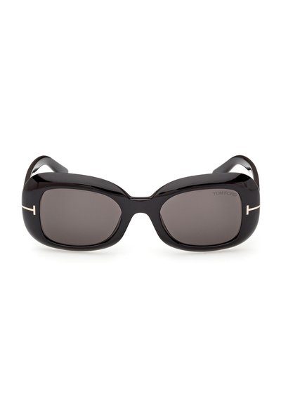 Lunettes de soleil rectangulaires noires avec des montures épaisses, des verres foncés et des accents métalliques subtils sur les branches.