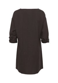 Tunika di colore marrone scuro con maniche tre quarti, scollatura ampia e polsini arrotolati. Realizzata in un morbido e leggero tessuto con una vestibilità comoda.