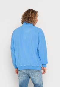 Tommy Jeans Fleecetröja - blue