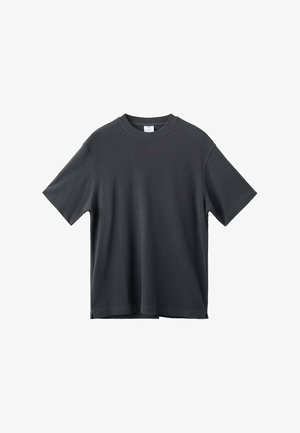 Mörkgrå bomulls t-shirt med korta ärmar, rund halsringning och avslappnad passform. Har en rak nederkant och minimala sömnadsdetaljer.