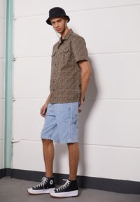 GARYVILLE - Shorts di jeans - blue