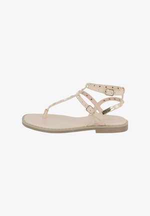 Flade beige sandal med multistropdesign, guld hardware detaljer og let polstring. Har en simpel tåpost og minimal slidbanemønster.