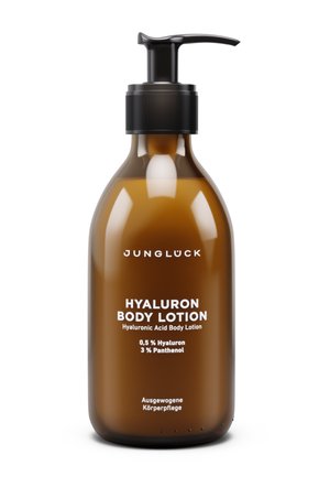 Braune Pumpspenderflasche mit der Aufschrift Jungluck Hyaluron Body Lotion mit 0,5 % Hyaluron und 3 % Panthenol für ausgewogene Hautpflege.