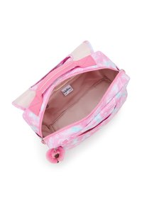 Zaino rosa con motivo floreale, chiusura a zip, doppi manici superiori e un charm a pompon di peluche. Internamente presenta un comparto principale.