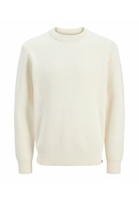 Maglione a coste color crema con scollatura rotonda, maniche lunghe e polsini elasticizzati. Il tessuto appare texturizzato e leggermente elasticizzato.
