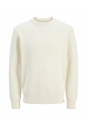 Maglione a coste color crema con scollatura rotonda, maniche lunghe e polsini elasticizzati. Il tessuto appare texturizzato e leggermente elasticizzato.