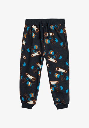 Donkergrijze pyjamabroek met een herhaald patroon van oranje en blauwe bouwvoertuigen. Elastische tailleband met een trekkoord. Zacht materiaal.