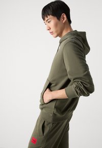 HUGO DARATSCHI - Kapucni - dark beige