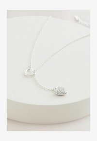 Sélectionné, silver tone