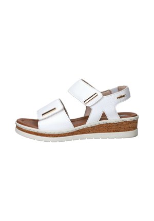 White leather sandal with cork wedge sole, two adjustable straps with gold accents, open toe, and brand logo on heel strap.