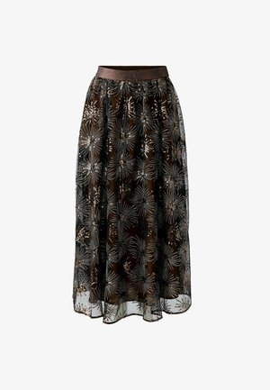 Jupe maxi en tissu noir transparent ornée d'une broderie florale métallique et de sequins, avec une large ceinture pailletée.