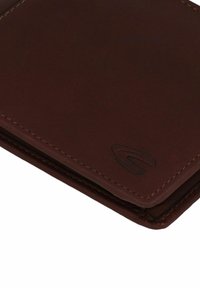 Brown leather wallet with stitched edges, featuring a smooth texture and a debossed logo on the bottom right corner.