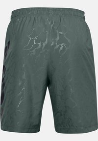 Pantaloni sportivi da uomo in tessuto verde scuro con una sottile texture a motivo e una cintura elastica. Dettagli neri sui lati.