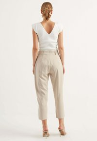 Chiquelle PENCIL - Tygbyxor - beige