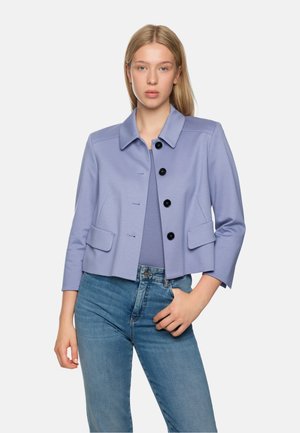 Light lavender cropped jacket with a collar, button front, and two front pockets. Smooth texture, tailored fit, and three-quarter sleeves.