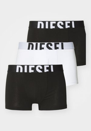 Három pár férfi alsónadrág fekete, fehér és szürke színben, széles gumis derékpánttal, amelyen kontrasztos színű "DIESEL" logó látható.