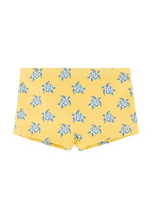 Bañador amarillo con un patrón completo de tortugas marinas azules y blancas, con un diseño ajustado de corte cuadrado.