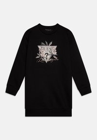 Sweatshirt noir avec un design graphique triangulaire orné d'accents floraux et de texte. Encolure et poignets côtelés. Texture douce.