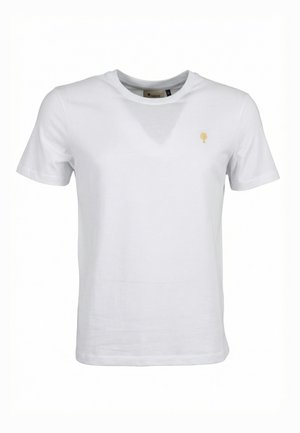 T-shirt bianca a maniche corte con scollo tondo e piccolo logo ad albero dorato sul petto a sinistra.