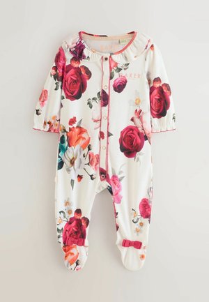 Bebina majica s cvjetnim uzorkom, bijele pozadine, uzorcima ruža i cvijeća, nabranim ovratnikom i kopčanjem na pritisak, s ružičastim detaljima na rukavima i nogavicama.